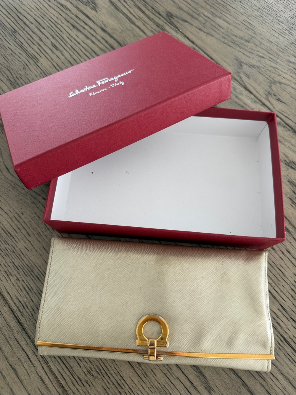 Salvatore Ferragamo Beige Leather Clutch with Gold Gancini Accent